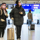 Travelers wear face masks at Germany’s Frankfurt Airport.